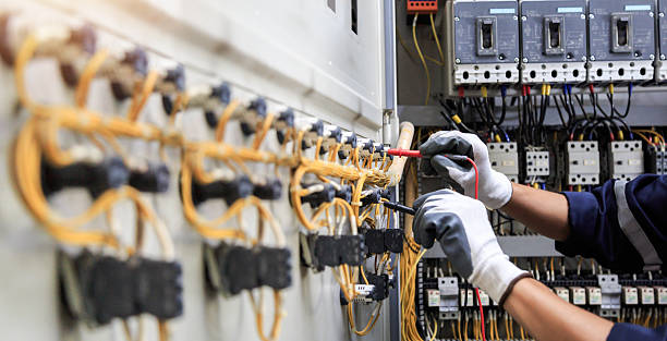 Professional Electrician technician working in Marion Center, MA